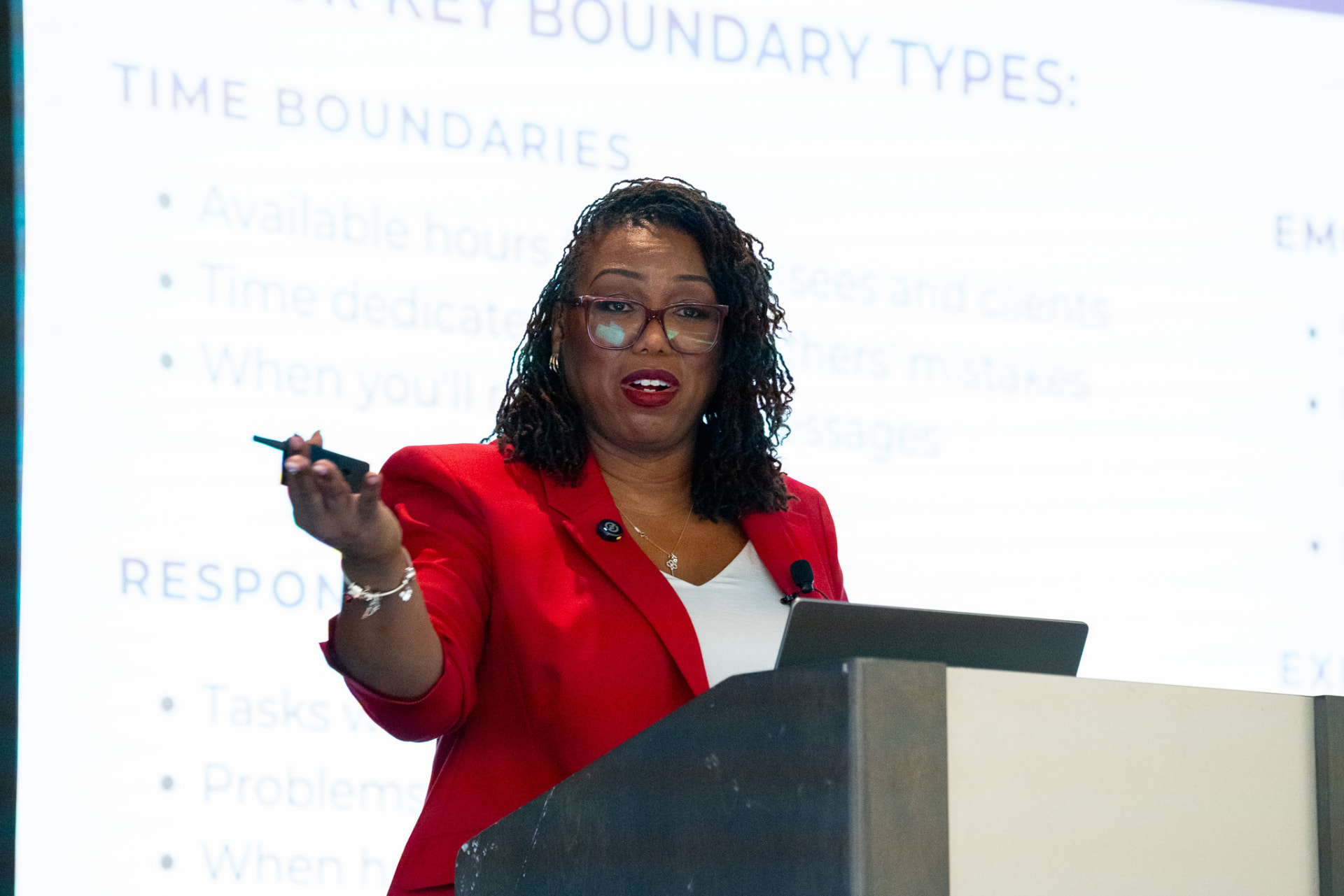 Coach Key gesturing while presenting a slide about boundary types